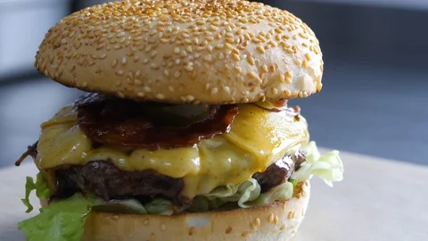 Chef builds burger. Preparing of the burger Stock Footage 86429894