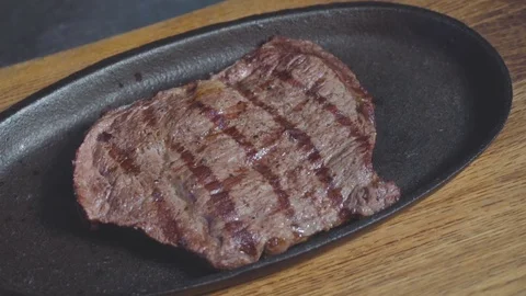 Chef burns the steak Stock Footage 73816434