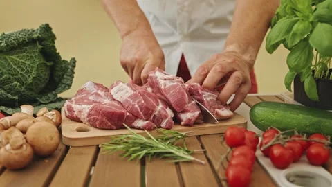 The chef carefully cuts the meat for the grill. Healthy eating concept. 스톡 동영상 248969360