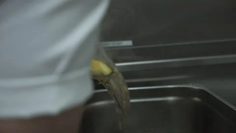Chef caring a big pan of hot soup Video stock 163317503