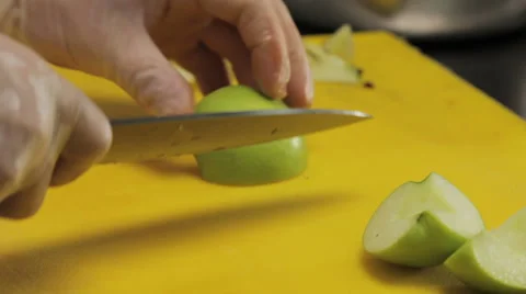 Chef carving an apple 動画素材 66076217