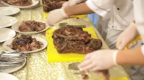 Chef carving roast pork Stock Footage 62475127