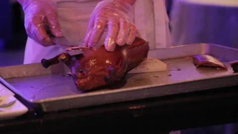 Chef Carving Roasted Poultry in Beijing Restaurant Kitchen Close-Up Stock Footage 345744072