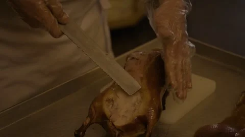 Chef Carving Roasted Poultry in Beijing Restaurant Kitchen, Close Up Food Stock Footage 345785293