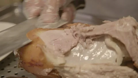 Chef Carving Roasted Poultry in Beijing Restaurant Kitchen, Close Up Preparation Stock Footage 345847832