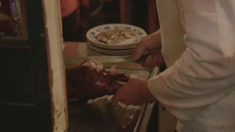 Chef Carving Roasted Poultry at Restaurant Counter in Beijing, China Stock Footage 345772774