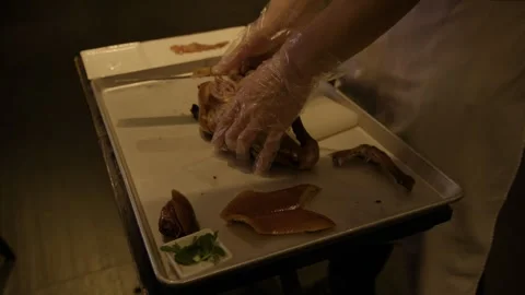 Chef Carving Roasted Poultry Tableside in Beijing Restaurant, Close-Up Food Stock Footage 345765506