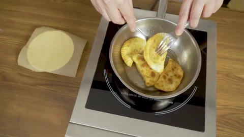 Chef Chebureks cooking frying pan Stock Footage 140059634