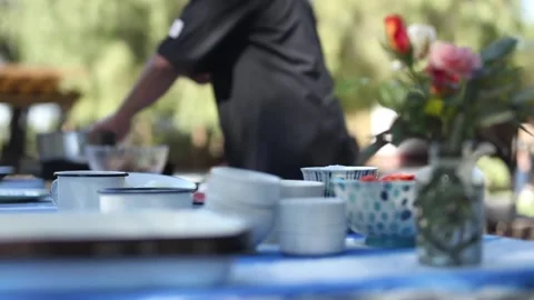 Chef checking mobile phone while cooking Stock Footage 133748680
