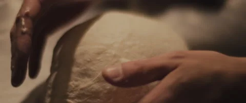 Chef checking the shape of the traditional pizza dough. Close up, slow motion Stock Footage 146920062
