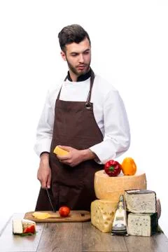 Chef with cheeses Stock Photos