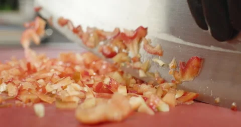 Chef chop red bell pepper with an axe. Male hands cut vegetables, close-up Stock Footage 264410707
