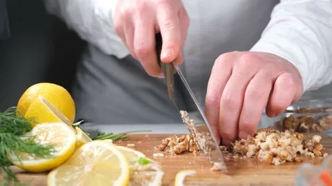 Chef chopped walnuts Stock Footage 228994934