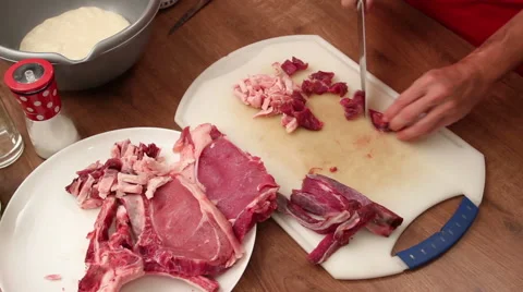 Chef chopping beef ribs - close-up Stock Footage 58534489