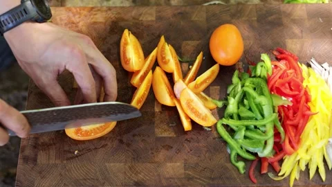 Chef Chopping Fresh Vegetables on a Cutting Board Stock-Footage 280099677