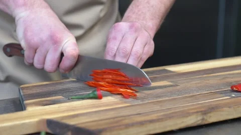 Chef Chopping Fresh Vegetables on Cutting Board in Commercial Kitchen Stock-Footage 321366699