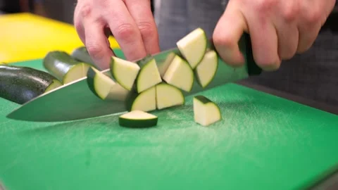 Chef Chopping Fresh Vegetables on Cutting Board in Commercial Kitchen Stock-Footage 321367639