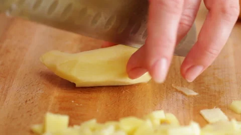 Chef chopping ginger, closeup Stock Footage 56344633