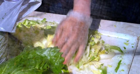 Chef chopping lettuce preparing fresh vegetables gourmet food salad, 4K Stock Footage 95089436