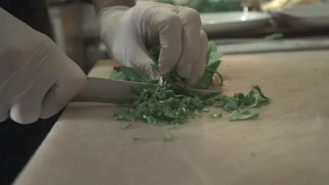 A chef' chopping mint. Close-up shot Stock Footage 144034273
