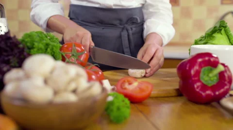 Chef chopping mushroom slow motion Stock Footage 49095017