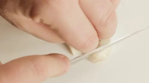 Chef chopping mushrooms Stock Footage 12692829
