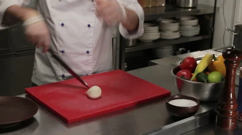 Chef chopping onion finely, medium shot Stock Footage 66061784