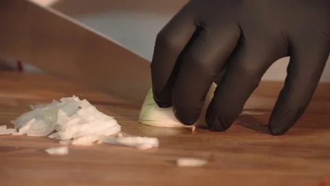 The chef is chopping onions for cooking Stock Footage 158021877
