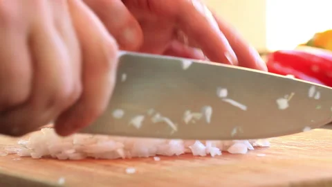 Chef chopping onions in the kitchen Stock Footage 232926833