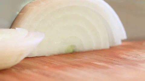 A Chef chopping onions in the kitchen Stock Footage 232933956