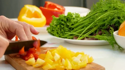 Chef Chopping Peppers On Cutting Board Stock Footage 77757797