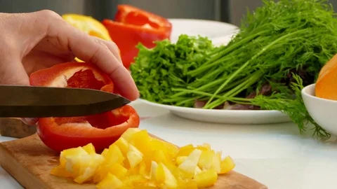 Chef Chopping Peppers On Cutting Board Video stock 83460253