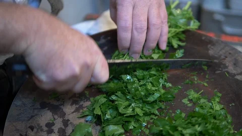 Chef chopping up Radish stem. Stock-Footage 107784076