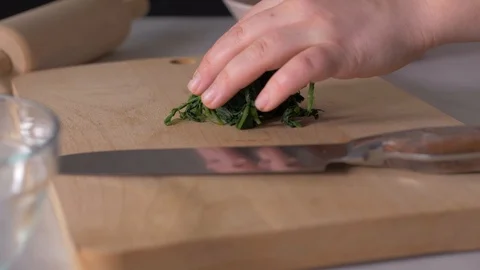 Chef Chopping Up Raw Spinach Leaves Stock Footage 103859590