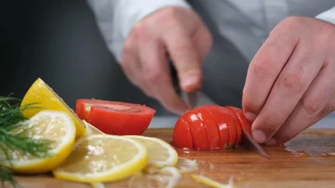 Chef chopping tomato Stock Footage 230482815