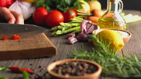 Chef chopping vegetables in kitchen Stock Footage