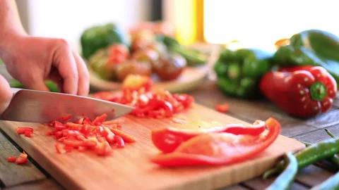 Chef chopping vegetables at the kitchen Stock Footage 232933229