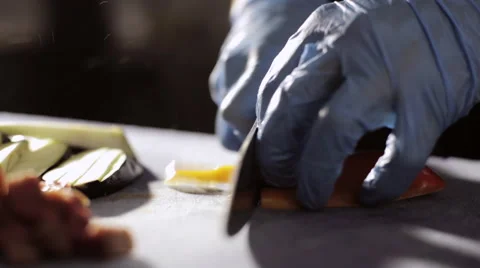 Chef is chopping yellow bell pepper, closeup. Stock Footage 68850790