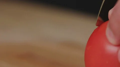 Chef chops and minces vegetables tomatoes a before cooking Stock-Footage 82484958