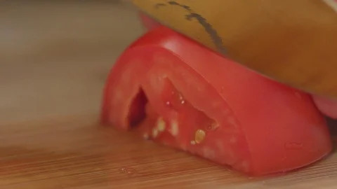 Chef chops and minces vegetables tomatoes a before cooking Stock Footage 82485978