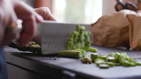 Chef chops celery for dinner Stock Footage 205484655