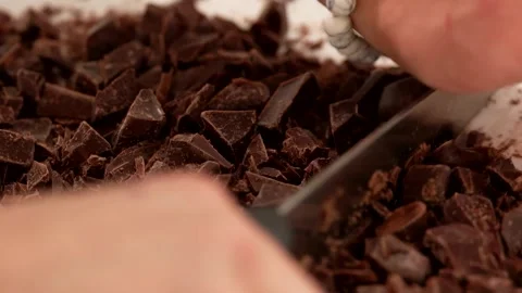 Chef chops chocolate Stock Footage 254423251