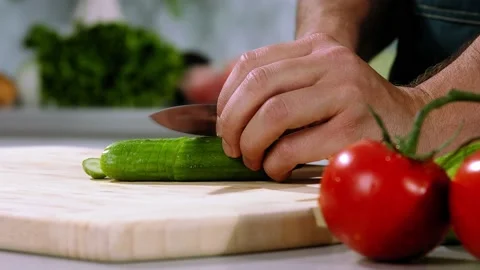 Chef chops the cucumber Stock Footage 236206732