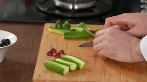 Chef chops grapes Stock Footage 183564436