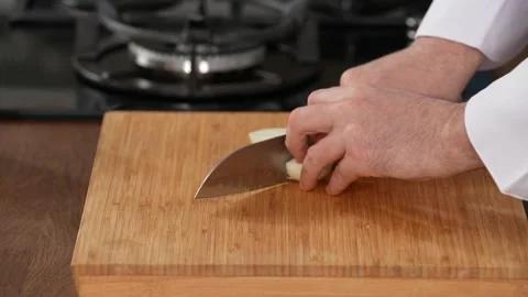 Chef chops onions Stock Footage 183555300
