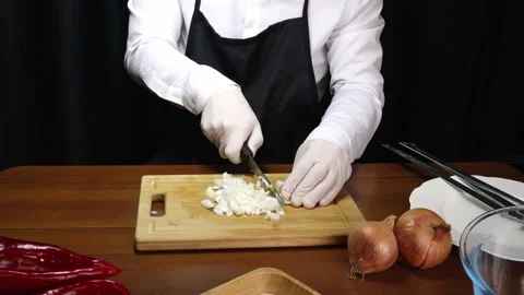 Chef chops onions 스톡 동영상 190074894