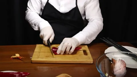 Chef chops red pepper Stock-Footage 190078564