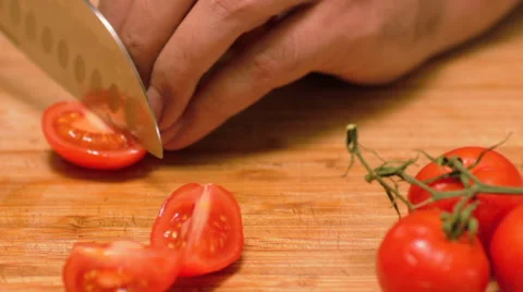 Chef Chops Vine Ripe Tomatoes with a Santoku Knife Stock Footage 62747184