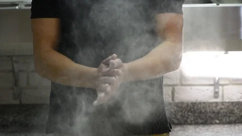 Chef clap hands making flour dust Stock Footage 100818865