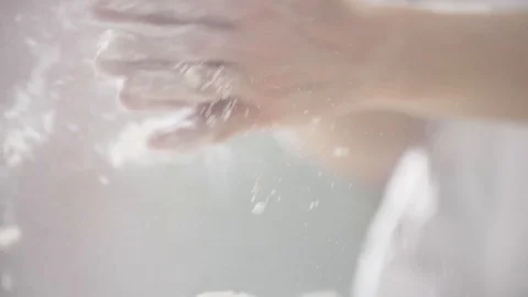 Chef clapping his hands filled with flour. Stock Footage 88683527